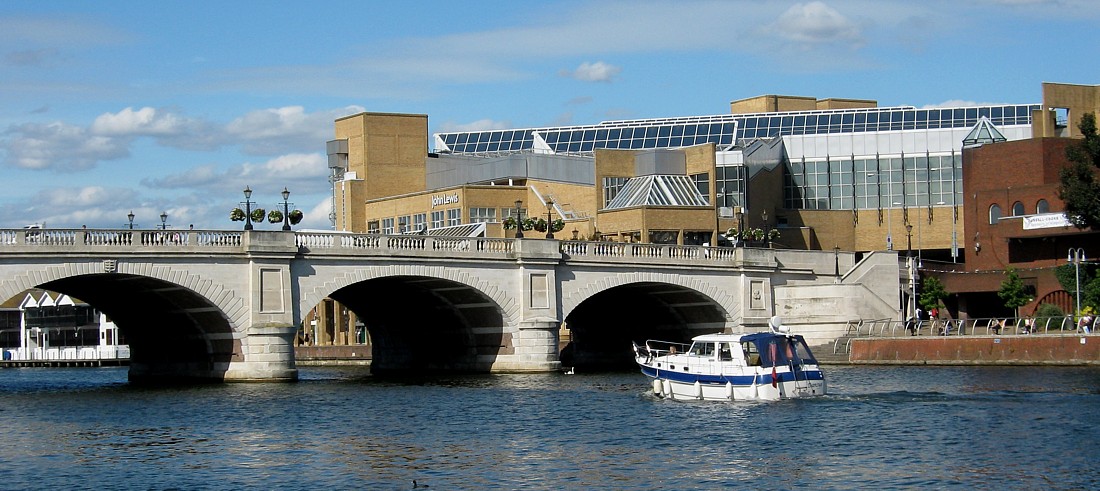 Motorboat under Kingston Bridge